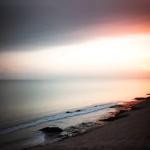 Sunset Horizon Reflection on Tropical Beach