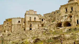 Medieval fortress tower against city skyline