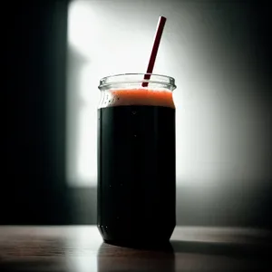 Refreshing Fruit Drink with Capacitor-Styled Glass and Straw