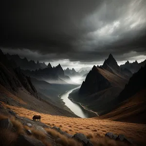 Majestic Desert Canyon amidst Snow-Capped Mountains