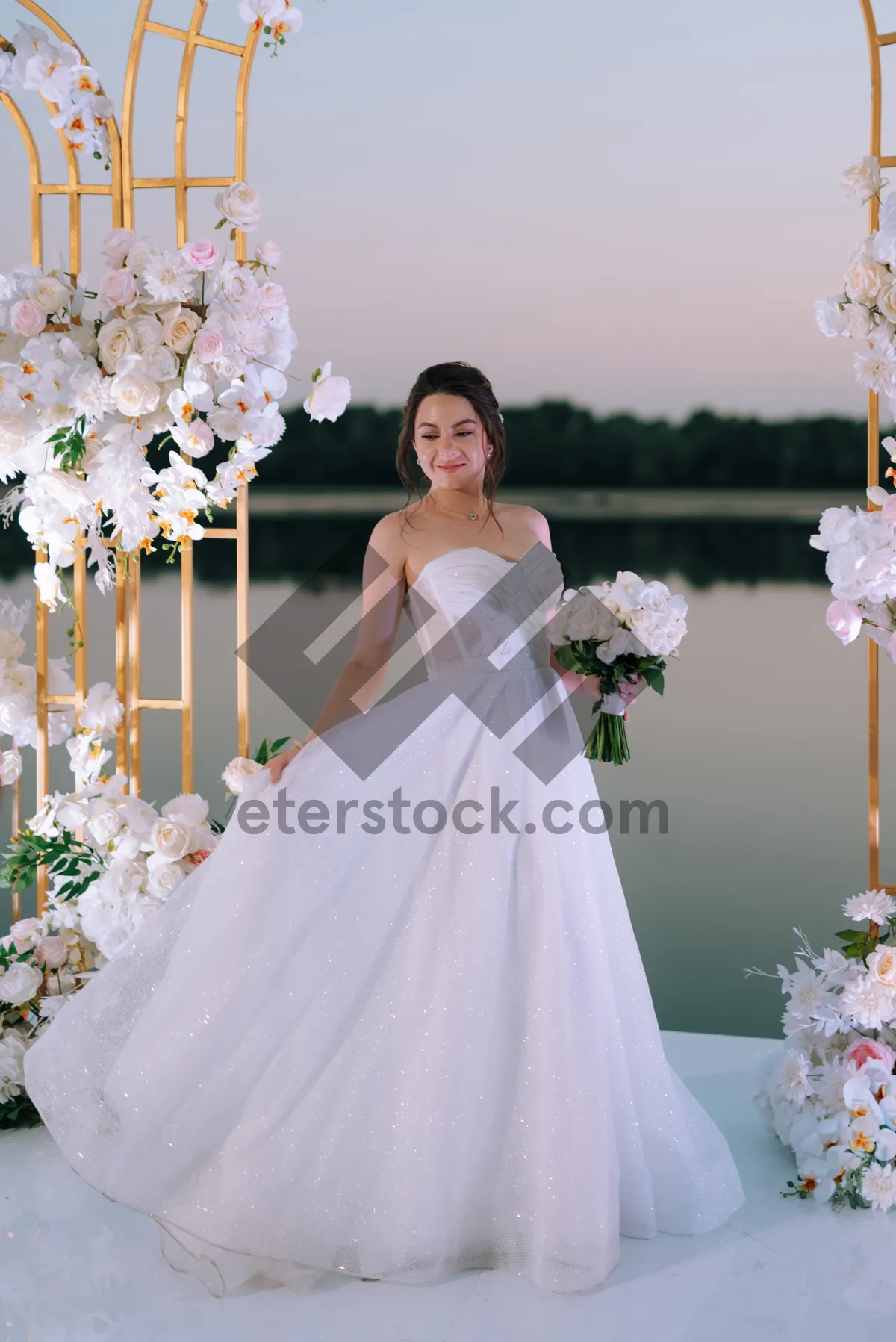 Picture of Happy Wedding Couple in Love with Flowers Bouquet