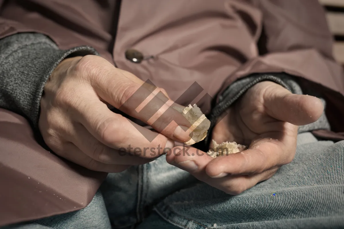 Picture of Child lying on man's hand