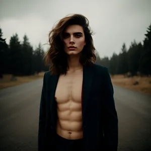 Attractive brunette businesswoman smiling in professional attire