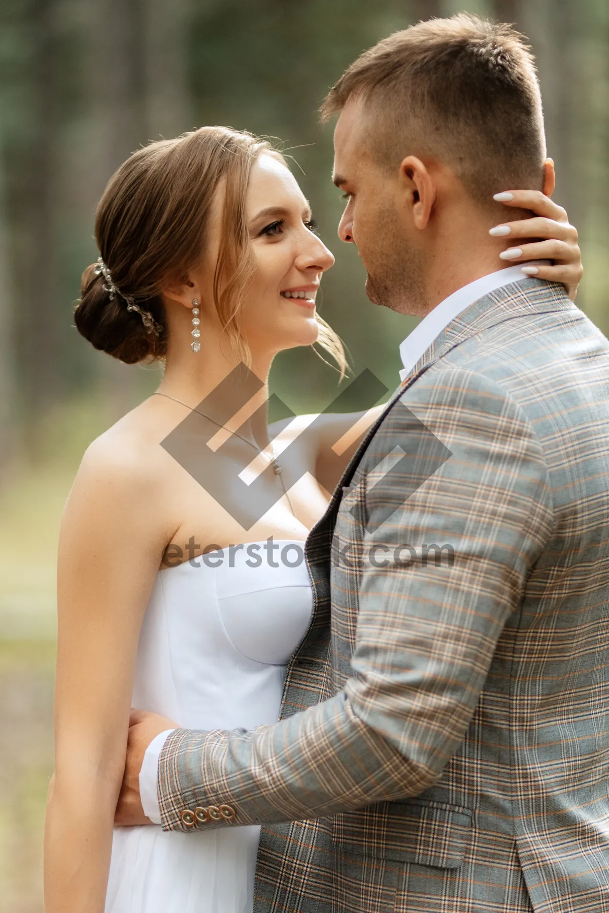 Picture of Happy couple outdoor wedding portrait romantic love bride groom.