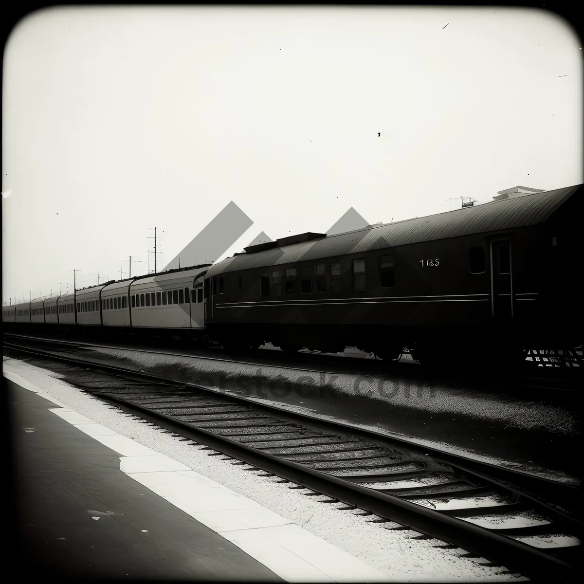 Picture of High-speed passenger train zooming through urban traffic