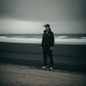 Adventurous Sunset Shore: Beach Couple Embracing the Waves