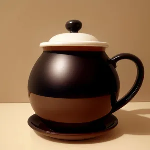 Hot traditional tea in ceramic teapot