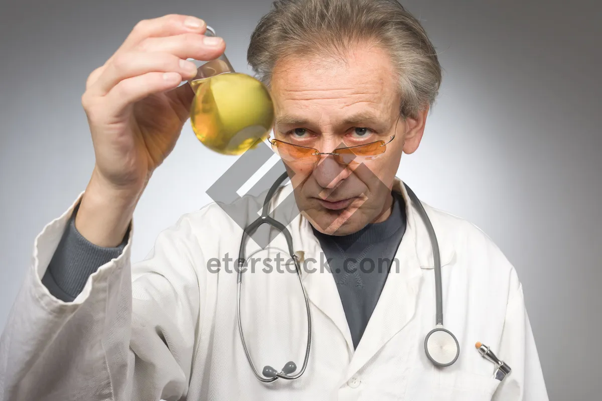 Picture of Smiling doctor with stethoscope in hospital setting