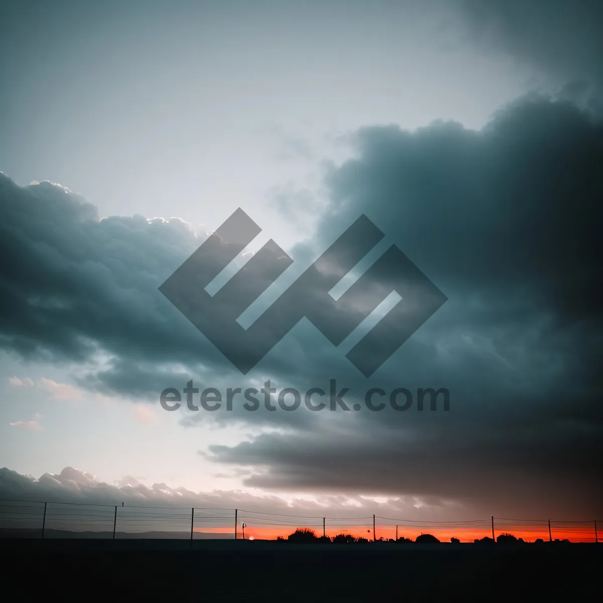 Picture of Colorful Sky at Sunset: Beautiful Horizon with Orange Sun and Clouds
