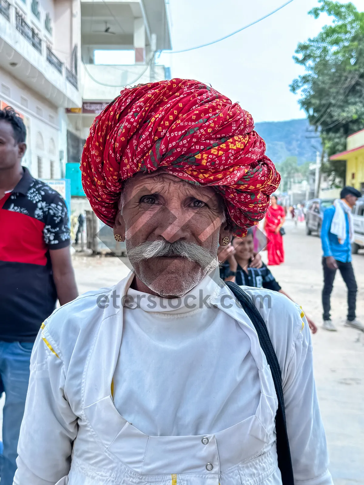 Picture of Senior male doctor with neck brace and mask