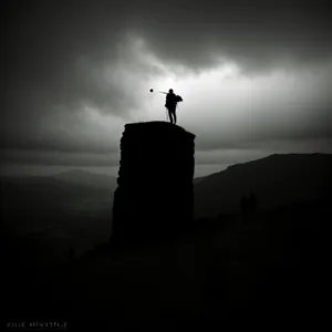 Eternal Silhouette: Towering Memorial at Sunset