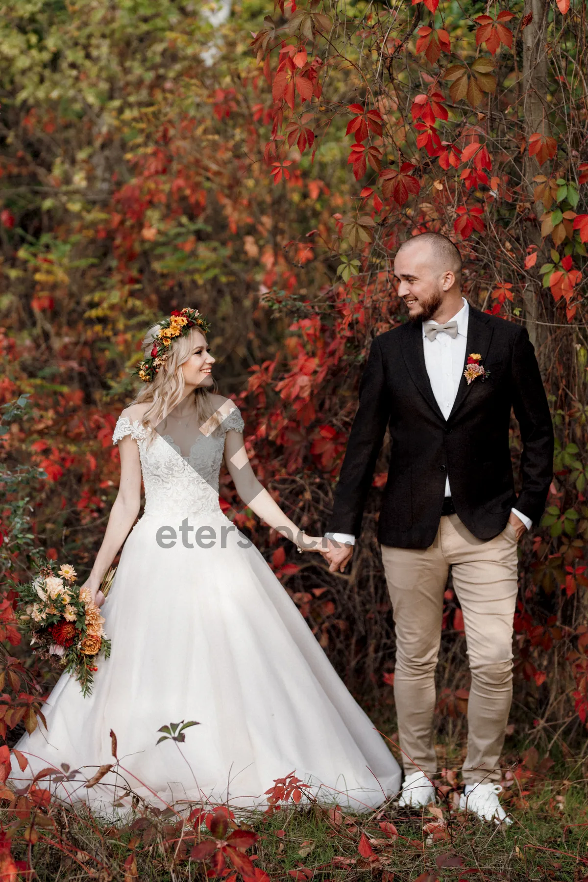 Picture of Happy wedding couple in love, smiling cheerfully