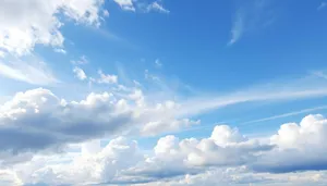 Vibrant Summer Sky with Fluffy Clouds