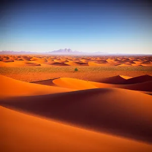 Sunset Over Moroccan Dunes: Majestic Orange Sky and Sand