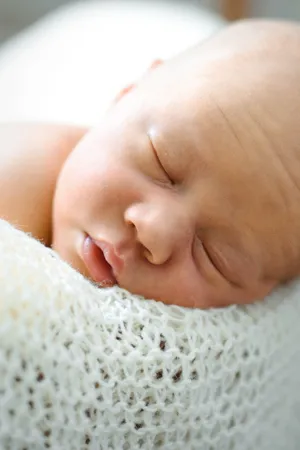 Happy Baby Boy Relaxing in Spa Treatment.