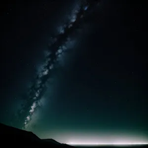 Starry Night Sky Over Volcanic Terrain