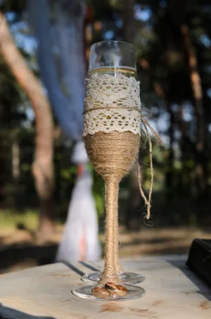 Party wineglass on gold tray with birch switch