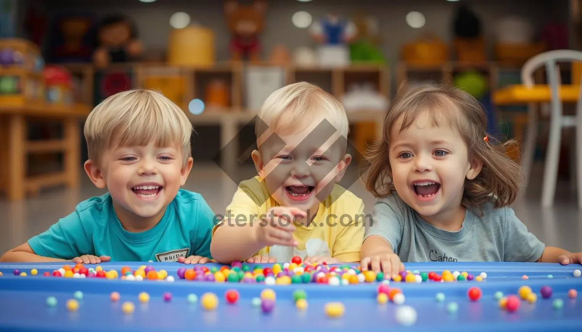 Picture of Happy family of four smiling at camera.