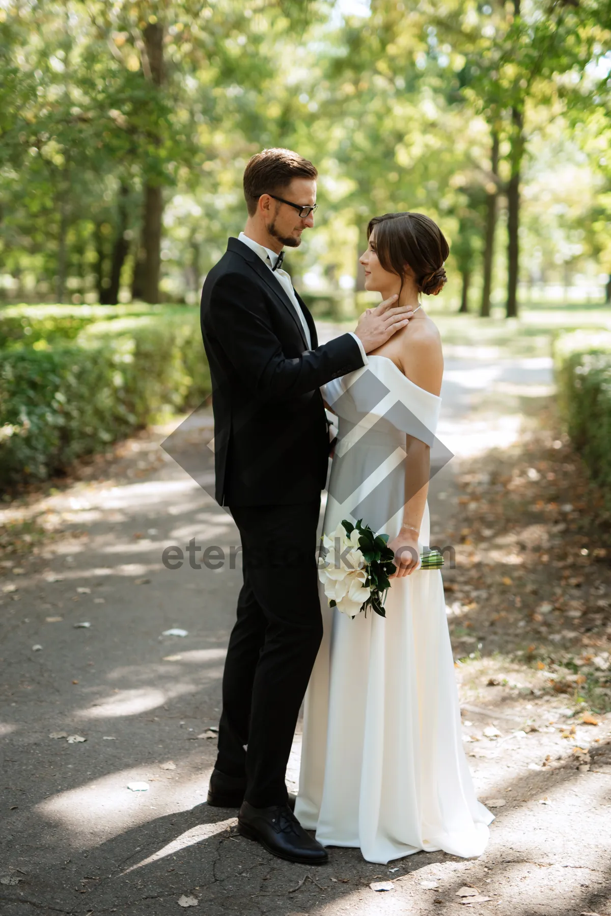 Picture of Happy Wedding Couple Smiling Outdoors in Love.