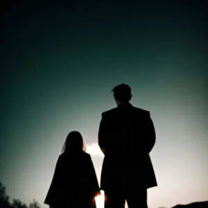 Romantic Sunset Silhouette of Newlywed Couple