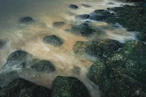 Ocean Waves Crashing on Rocky Coastline