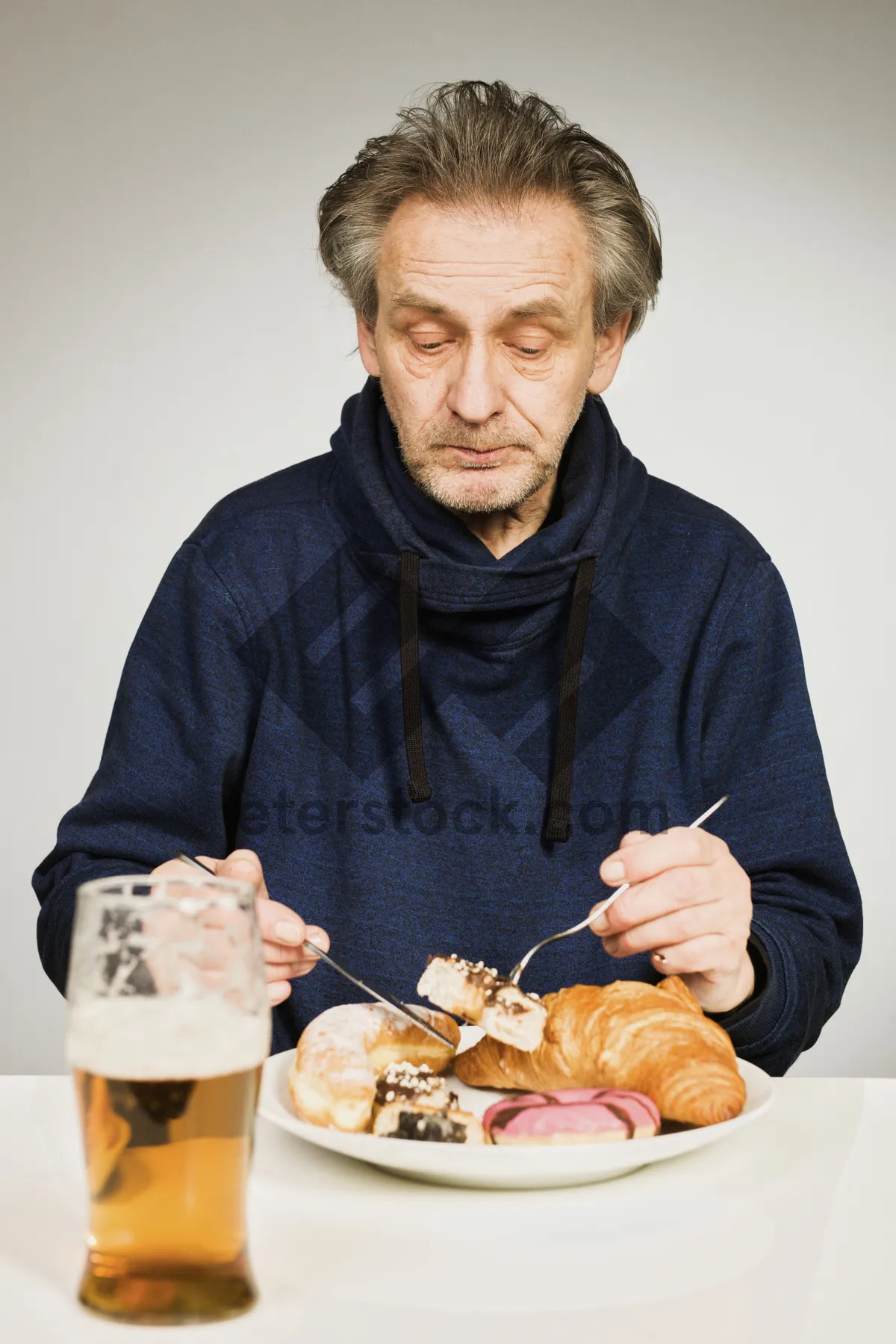 Picture of Happy elderly couple enjoying delicious crab dinner at home.