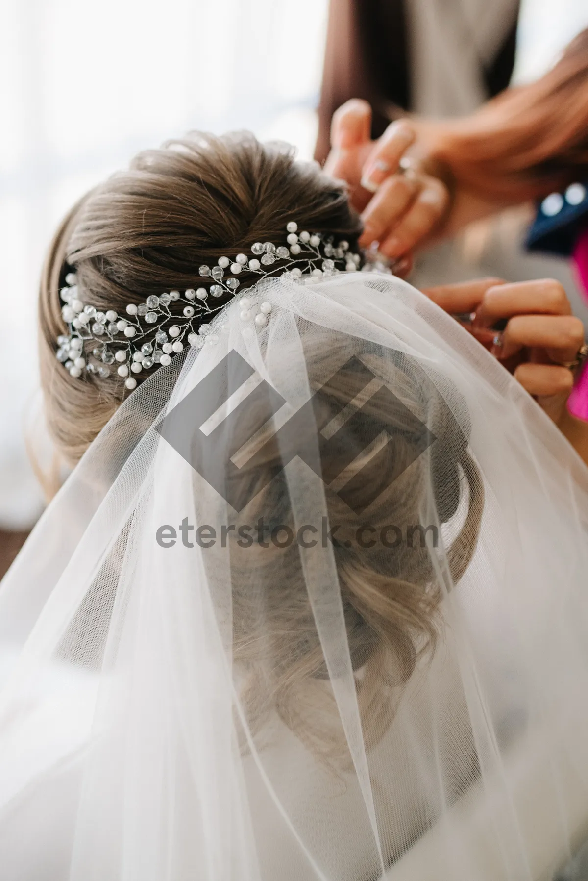 Picture of Happy bride and groom with bouquet at wedding