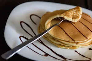 Delicious chocolate cake with coffee sauce swirls