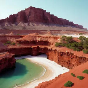 Serenity Falls: Majestic Desert Canyon Overlooking Vast Valley