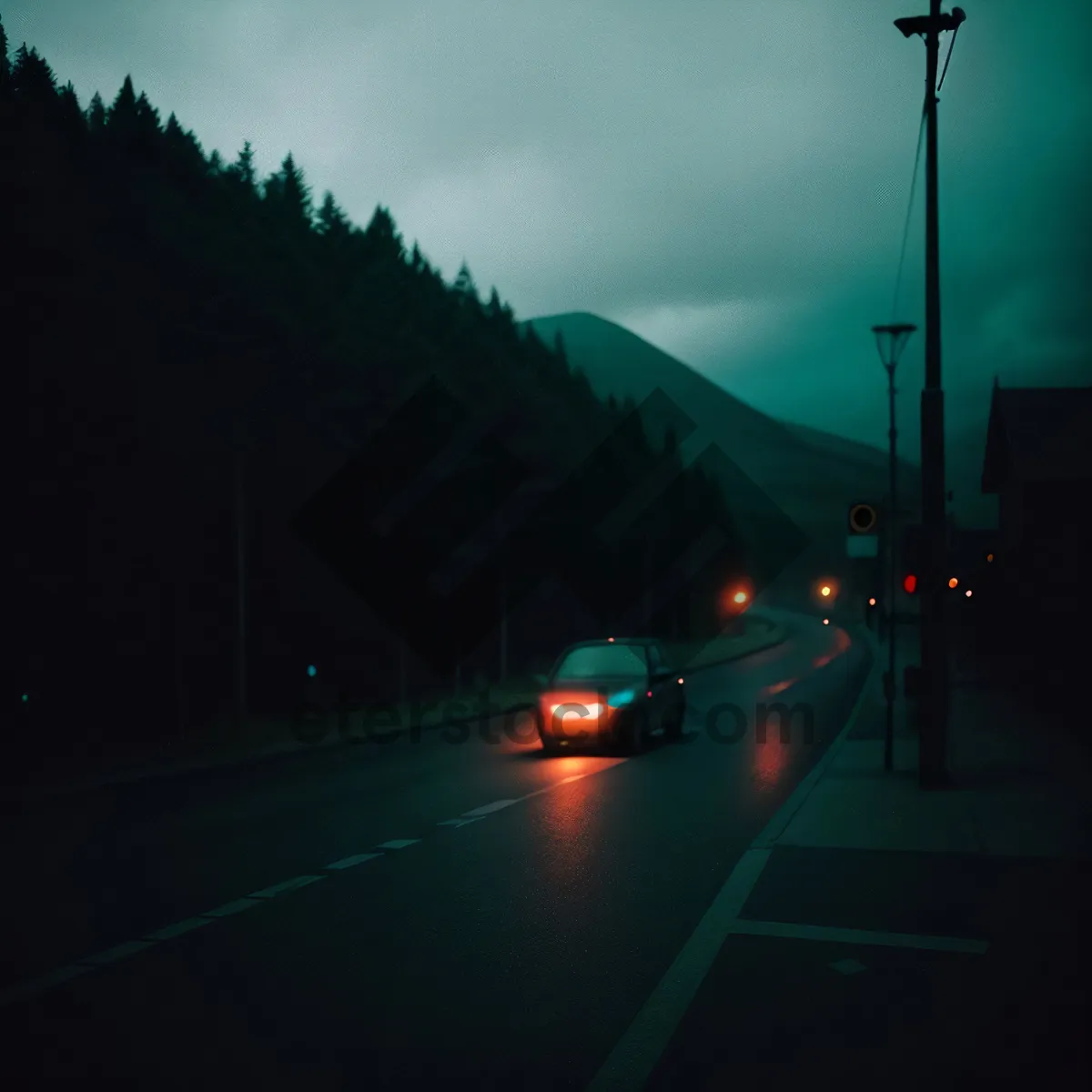 Picture of Nighttime cityscape with busy intersection and speeding cars