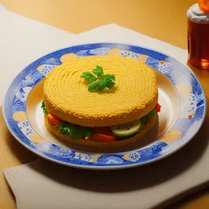 Delicious gourmet cheese and tomato sandwich on plate