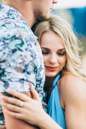 Happy blond woman in cozy pajamas smiling