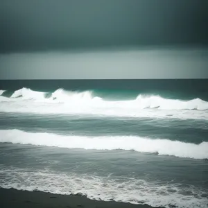 Turquoise Waters Sparkling Against Sandy Shoreline