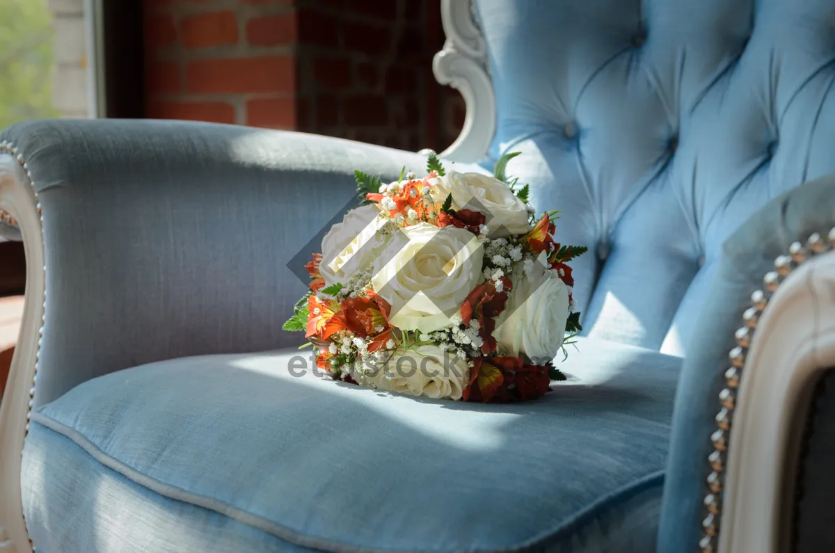 Picture of Happy Bride and Groom Wedding Celebration with Flowers