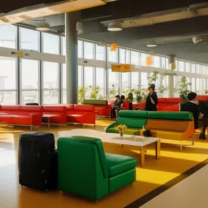 Modern library with stylish furniture and ample natural light.