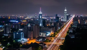 Modern city skyline at dusk with river reflection.