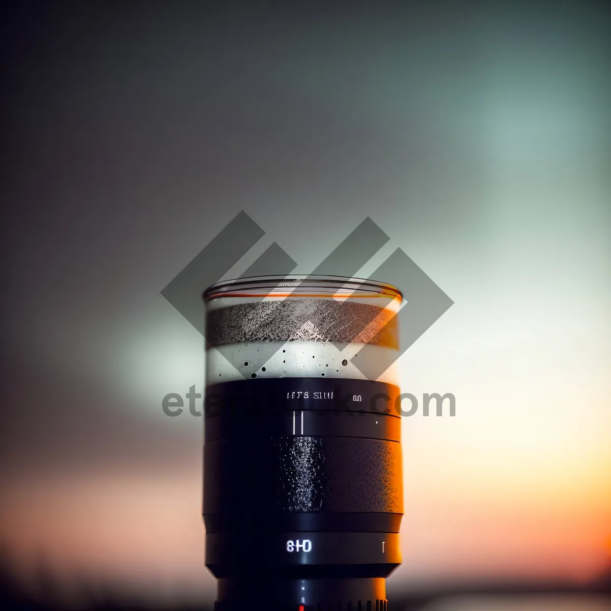 Picture of Glass bottle containing alcoholic beverage and photographic equipment