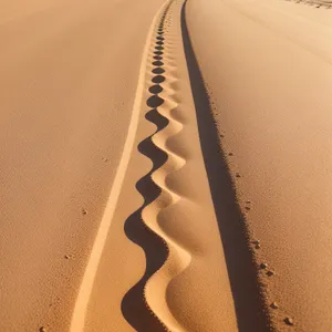 Sculpted Sands with Piercing Blade