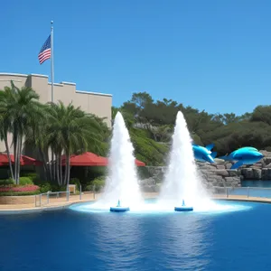 City Resort Fountain With Skyline Reflection