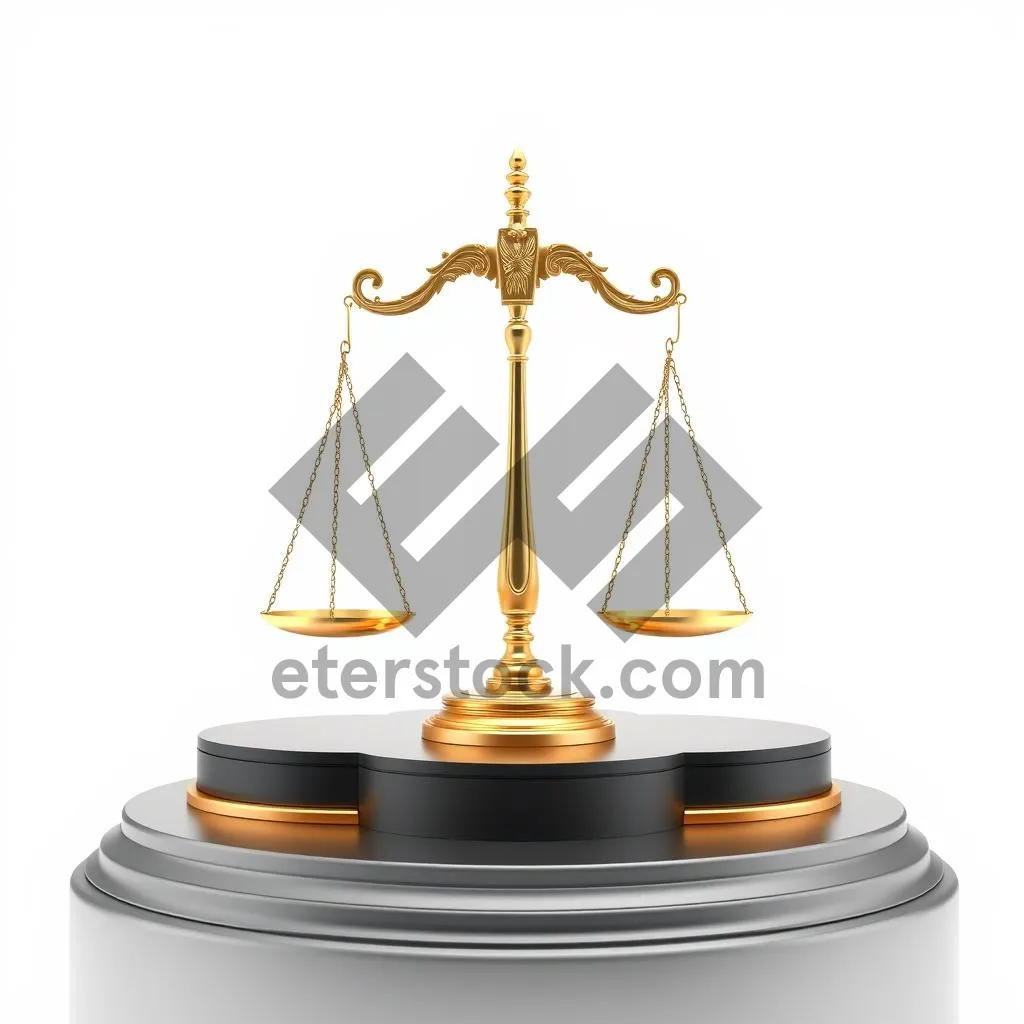 Picture of Golden justice symbol on brass scale