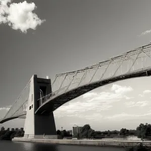 Iconic Nighttime Cityscape: Towering Suspension Bridge over Bay