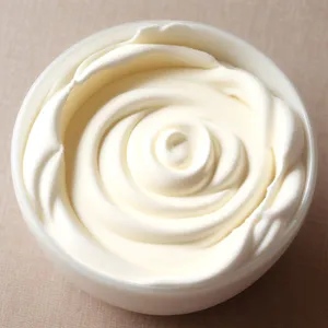 Artistic Butter and Yogurt Pattern on White Background