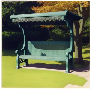 Wooden Park Bench with Armrests and Empty Seating Area