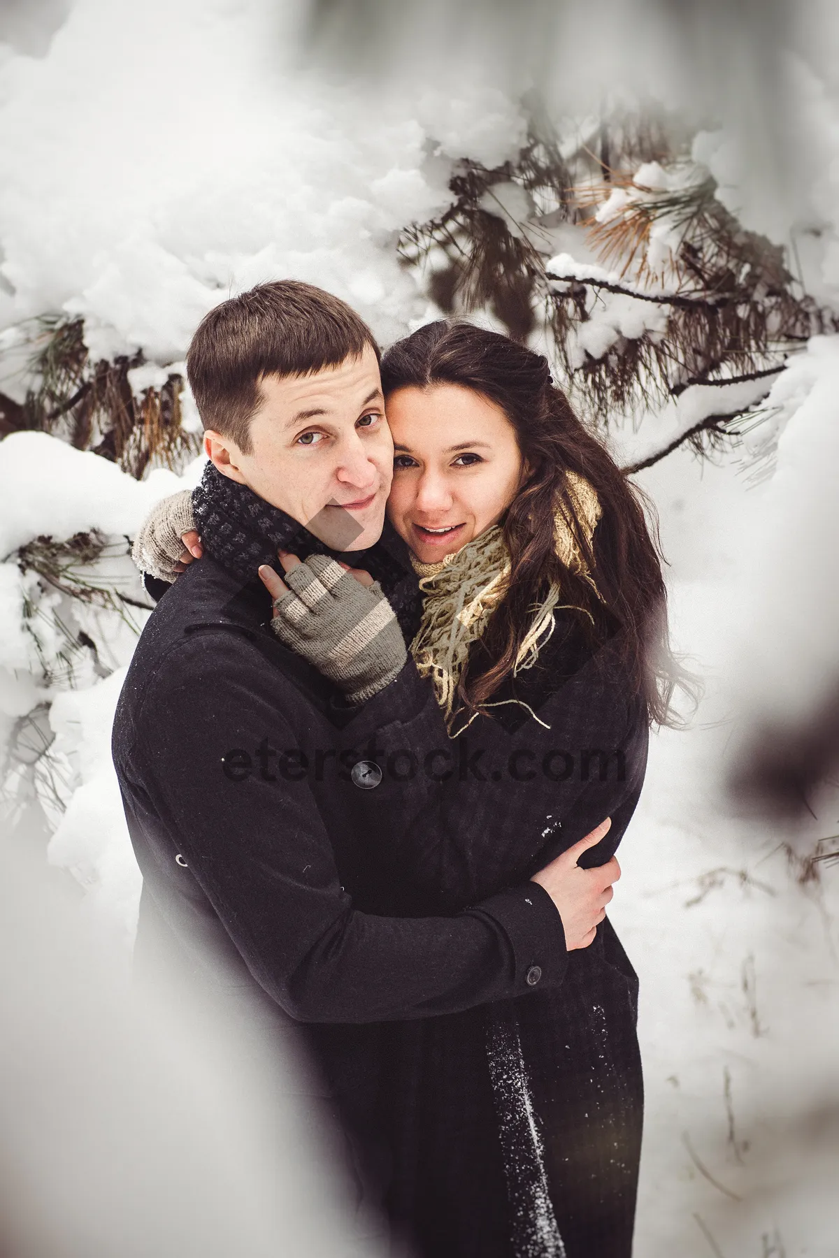 Picture of Happy man and child smiling outside in the snow