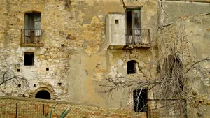 Historic Castle Tower in Medieval Town Facade