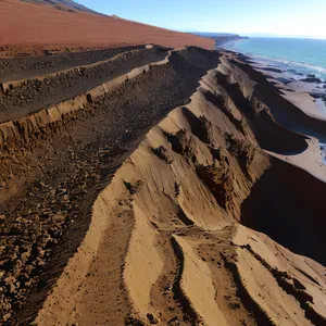 Desert Landscape: Majestic Dunes and Rocky Mountains