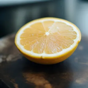 Fresh sliced citrus fruits - oranges, lemons, and limes