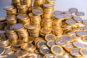 Golden coins stack in closeup business finance concept