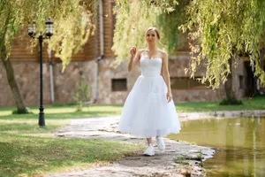 Happy Bride and Groom Posing Outdoors