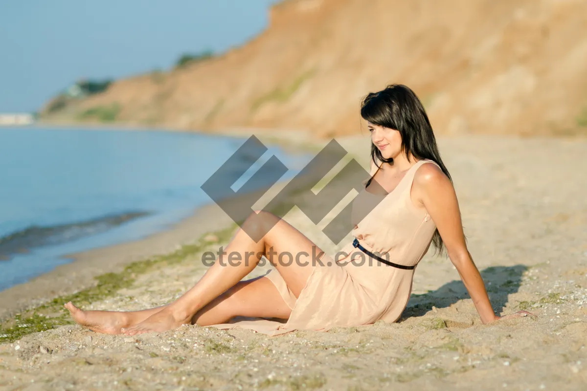 Picture of Happy model in bikini enjoying beach vacation